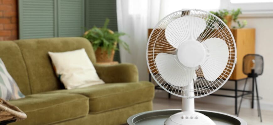 Electric,Fan,On,Coffee,Table,In,Living,Room,,Closeup
